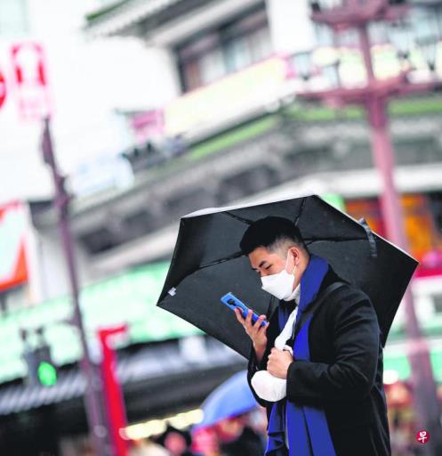 日本流感与冠病疫情升温 官方吁民众戴口罩